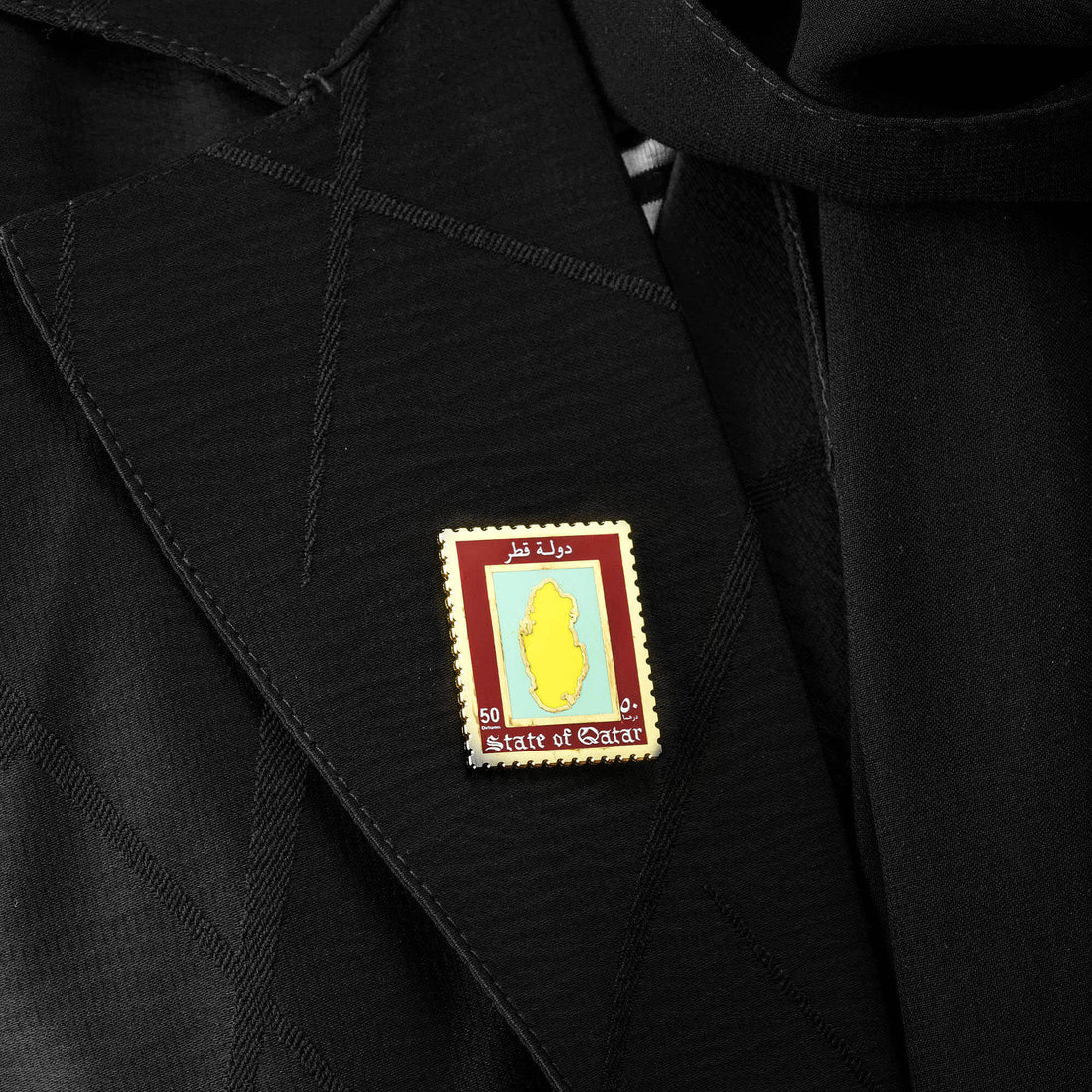 Pin: Qatar stamp (available as a pin or clothes magnet)