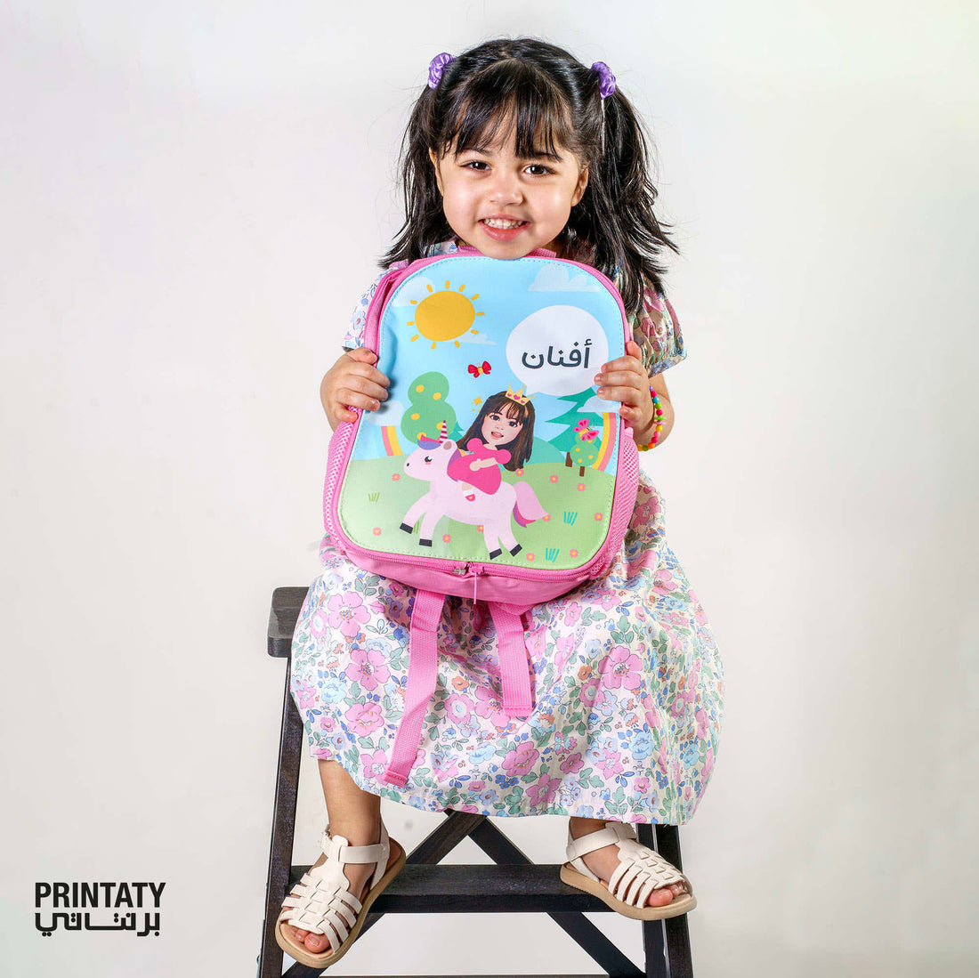 A Small School Bag (suitable for young children) With The Name and Photo of the Child Printed
