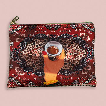 شنطة صغيرة : سجادة  وقهوة