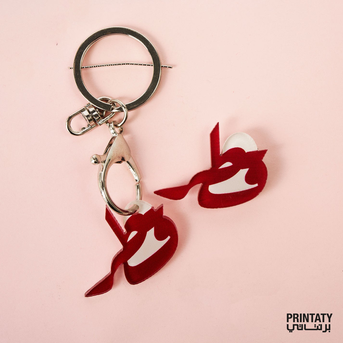 The word Qatar (Fridge or Medal)