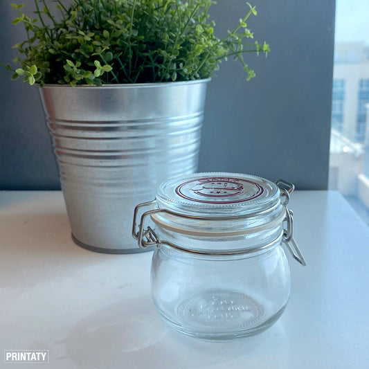 Empty glass jar printed on Qatar